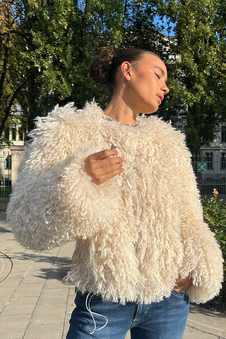 FRINGED FAUX FUR JACKET