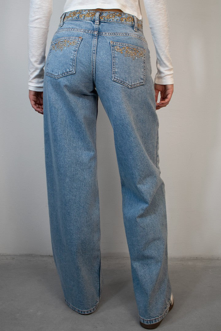 LOW-WAIST JEANS WITH EMBROIDERY AND STUDS