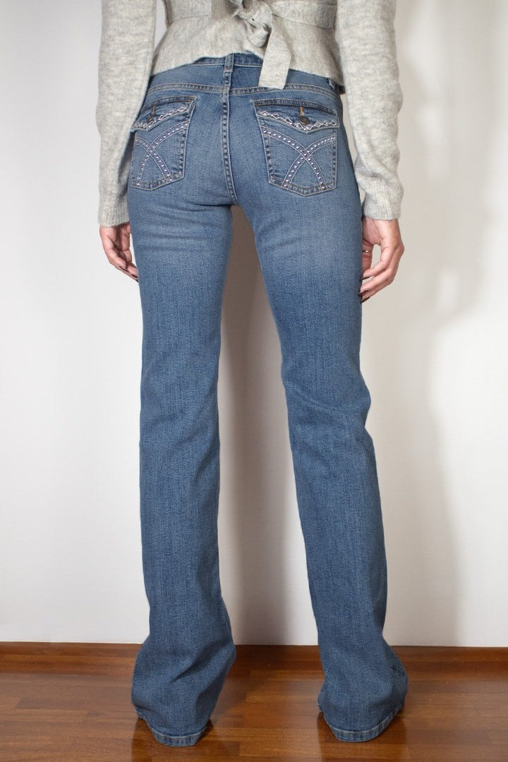 FLARED JEANS WITH STUDS AND EMBROIDERY