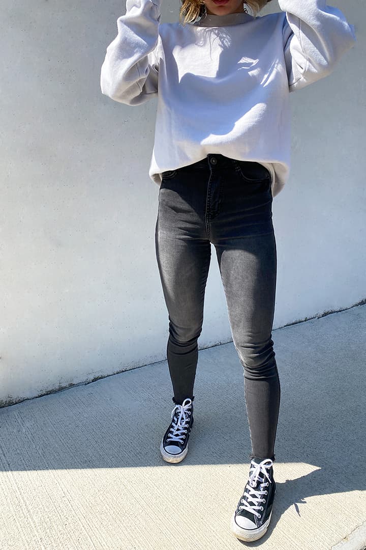 ASYMMETRIC SKINNY JEANS
